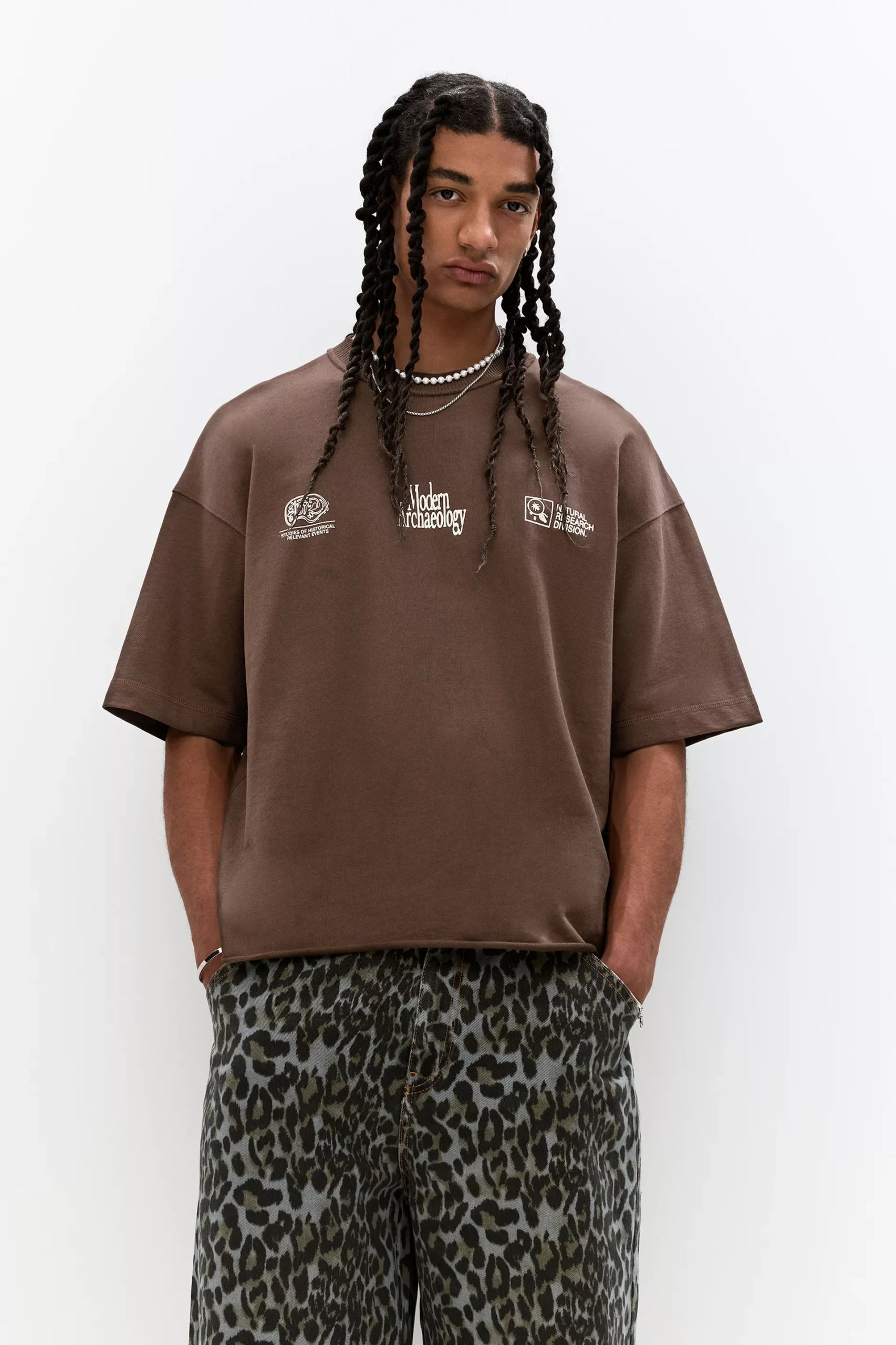 Brown T-shirt with Modern Archaeology graphic